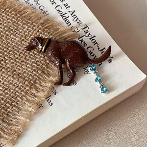 Pooping Dog Brooch with Blue Accents